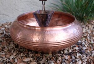 A Bella Dish in Copper for Rain Water Collection